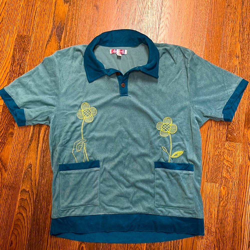 Urban Outfitter’s XL Blue/Aqua terry cloth shirt. Double pockets in front.